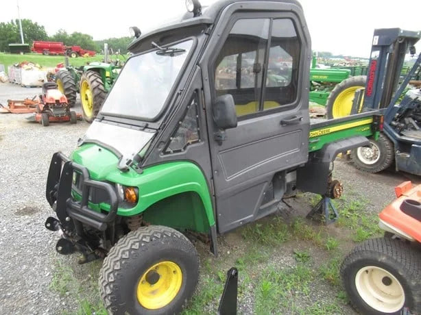 John Deere Gator Diesel with Enclosed Cab For Sale image 1